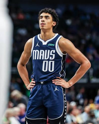 Max Christie in a navy Dallas jersey